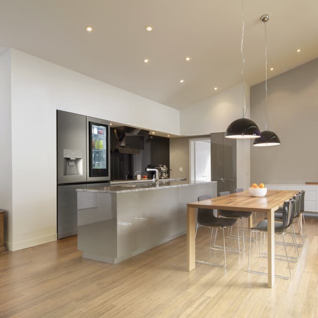 Front view of a modern kitchen with LG Signature appliances Front view of a modern kitchen with LG Signature appliances
